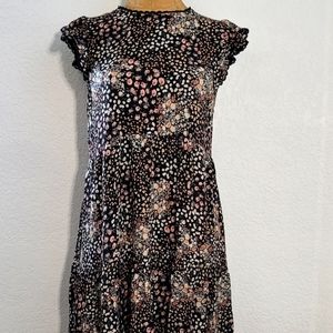 Floral baby doll style dress with flutter sleeve. Medium